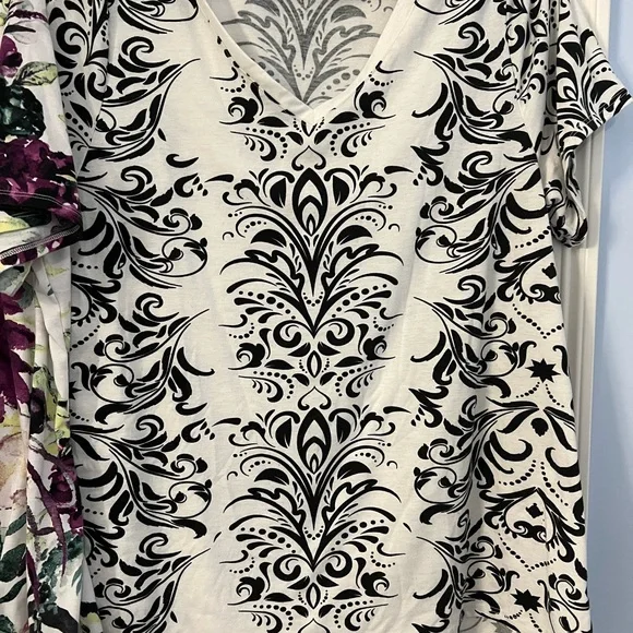 Pair of LuLaRoe v neck t shirts with longer hems. Floral and scroll - Picture 3 of 6